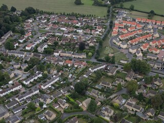 Aerial view of Boston Spa small village and remote suburb of civil parish in the City of Leeds metropolitan borough in West Yorkshire, England