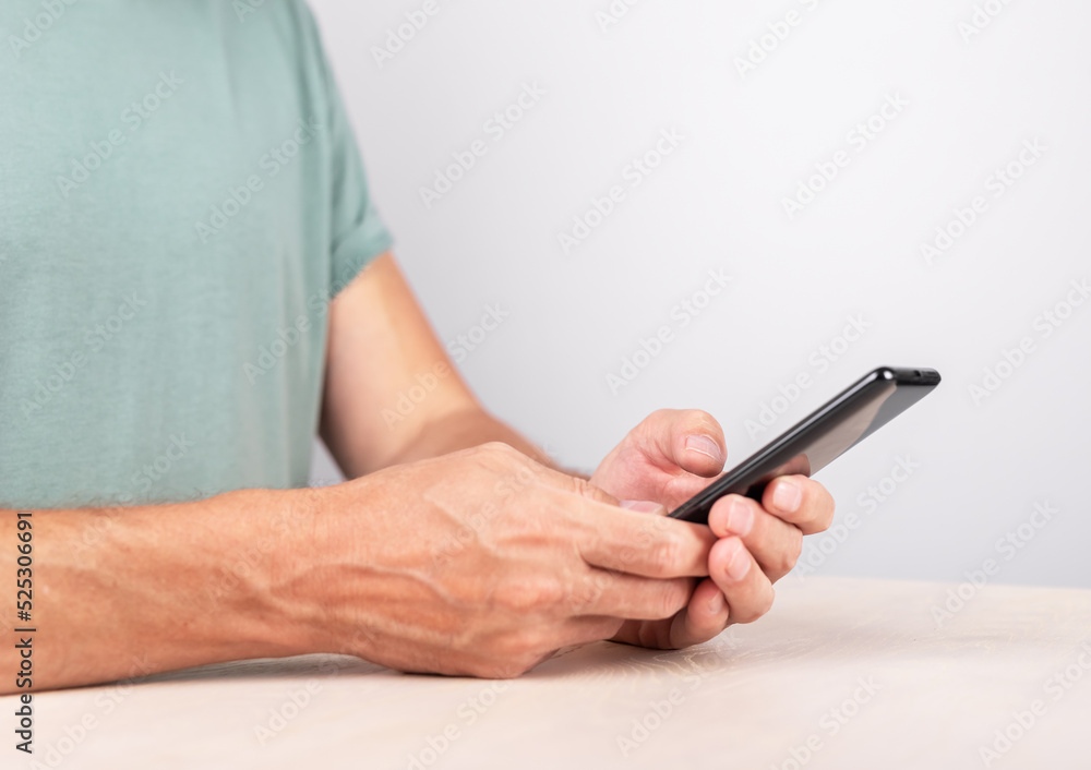 Poster Man hands closeup texting message at smartphone. Male using messenger. Device for social communication