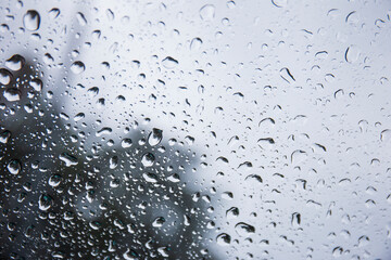 Raindrops on the background glass.