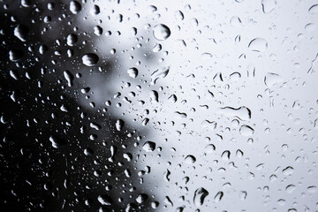 Raindrops on the background glass.