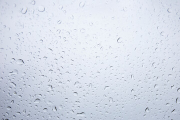 Raindrops on the background glass.