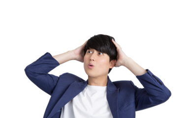 Cut out portrait of shocked excited young asian businessman with casual suit attire holding hands on head