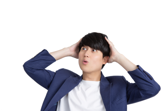 Cut out portrait of shocked excited young asian businessman with casual suit attire holding hands on head