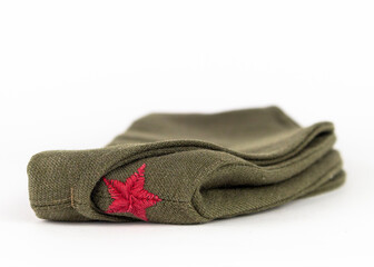 Military cap. Yugoslavian army side cap with red star from the time of communism and world war era - obrazy, fototapety, plakaty