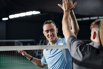 Friends Playing Badminton