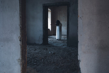 Scary ghost woman in haunted house