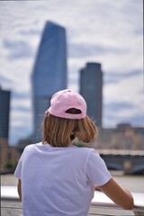 woman admiring the city of london.