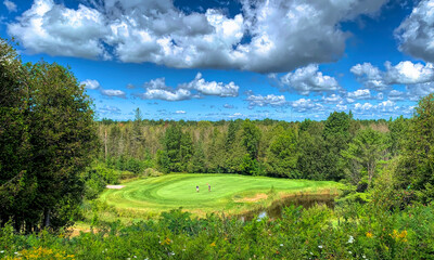 Fototapeta na wymiar Greensmere Golf Course on a beautiful summer day near Ottawa, Ontario, Canada 