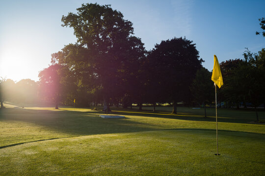 Early Morning Sunrise Light On Golf Course