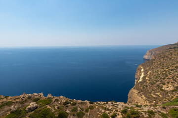 Fototapeta na wymiar The impressive Dingli cliffs on Malta’s Western coast. They stage the highest point of Malta around 253 metres above sea-level. Views are breathtaking, overlooking the small terraced fields below