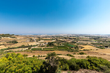 Fototapeta na wymiar View over the Island of Malta from the observation point of the former capital Mdina of the island which has a medieval defense wall with several lookouts.