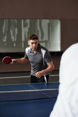 Sportsman Playing Table Tennis
