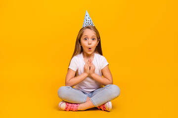 Full length photo of pretty impressed schoolgirl dressed white t-shirt birthday headwear isolated...
