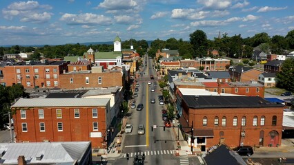 Low aerial view of main street usa, Charles Town, West Virginia, WV on a beautiful sunny day.