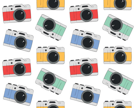 Vector seamless pattern of hand drawn doodle sketch colored photo camera isolated on white background
