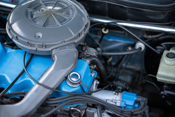 Fototapeta na wymiar Close up detail of old powerful car engine