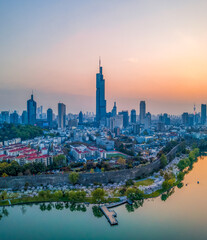 Aerial photography of Xuanwu Lake Scenic Spot and Greenland Zifeng Building in the distance, Nanjing City, Jiangsu Province, China © Changyu