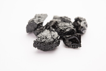 Shilajit is an ayurvedic medicine found primarily in the rocks of the Himalayas. selective focus