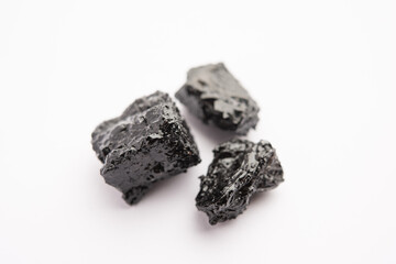 Shilajit is an ayurvedic medicine found primarily in the rocks of the Himalayas. selective focus