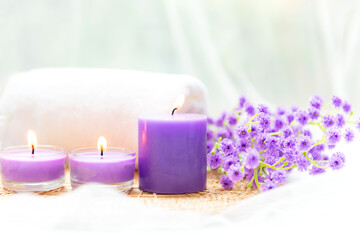 Obraz na płótnie Canvas Spa beauty massage health wellness background.  Spa Thai therapy treatment aromatherapy for body woman with purple flower nature candle for relax and summer time. Lifestyle Health Concept