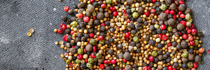 peppercorn 5 spices red, black, green and white pepper, coriander fresh food spice on the table copy space food background 
