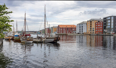 Fototapeta na wymiar Old warehouses buildings by the Nidelven (river) in Trondheim, Trøndelag, Norway, Scandinavia, Europe