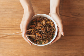 Soba noodles bowl background. Traditional Japanese soba noodles with chicken and vegetables. Asian food concept.