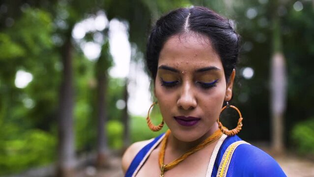 Beautiful Indian woman in traditional chaniya choli for navratri. Navratri is an Indian Festival and Chaniya choli its traditional costume