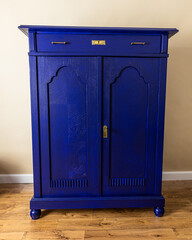 Blue painted furniture after renovation has second life