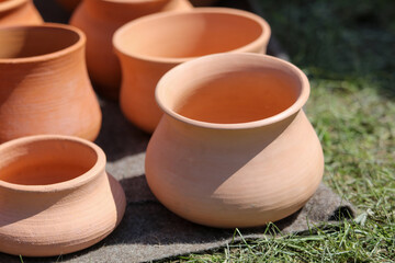 Clay jars at the market for food.