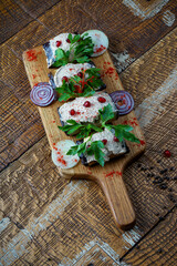 Georgian appetizer of eggplant in rolls with filling vertical photo
