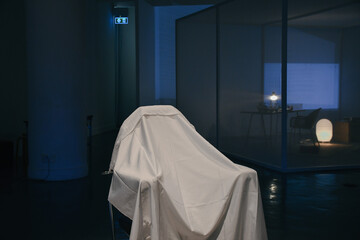 White chair covers in blue light