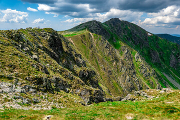 Fototapeta na wymiar A view of the beautiful surrounding alpine nature from the Chopok ridge in the Low Tatras, Slovakia