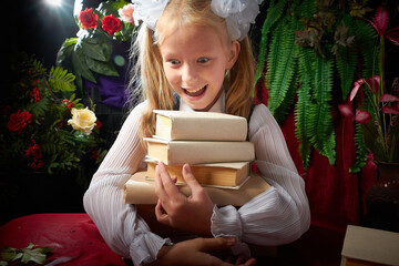 Girl who is elementary school children in uniform having photo shoot in school holiday on September 1 on black background with books. Holiday of the beginning of school and studing in Russia