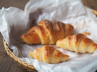 small, medium and big homemade butter croissants
