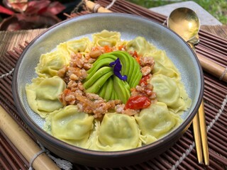Ravioli stuffed with chopped spinach Parmesan Cheese and Ricotta Cheese with avocados