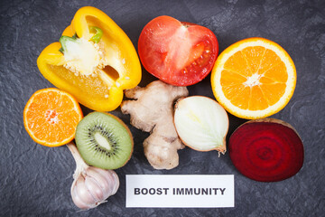 Inscription boost immunity with fruits and vegetables. Source vitamins, minerals and dietary fiber