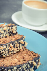 Fresh baked pastry made of zucchini and cup of white coffee. Delicious dessert