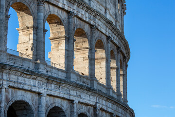 Fototapeta na wymiar Colosseum, 1st century antique, oval amphitheatre in the centre of the city, Rome, Italy