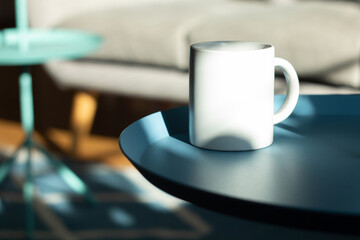 White mug on the table. - 525352228