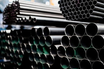 Steel pipes group for industry  material Product of engineering  construction Factory equipment iron tubes metal warehouse industrial  - Powered by Adobe