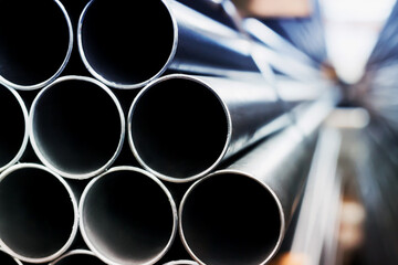 Steel pipes group for industry  material Product of engineering  construction Factory equipment iron tubes metal warehouse industrial  - obrazy, fototapety, plakaty