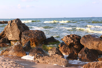 Fototapeta na wymiar natural stony beach seaside landscape in Spain close up photo
