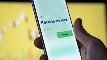 Investir dans un fonds etf pétrole et gaz actions en bourse sur un écran. Graphique, courbes,...