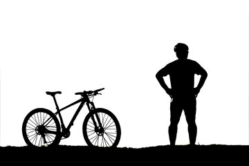 silhouette of a person riding a bike