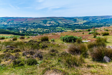 Fototapeta na wymiar A view from the top of the Bamford Edge escarpment across the Hope Valley in summertime
