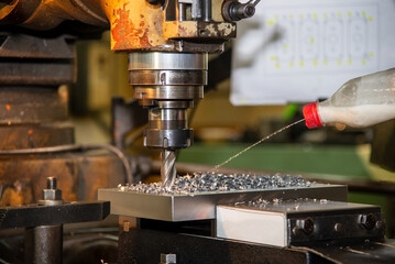 The drilling process on NC milling machine with coolant method.
