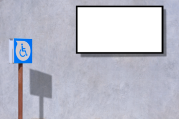 Transparent advertising billboard mockup with parking disabled wheelchair sign on loft concrete wall outside of shopping mall, png file