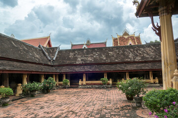 Wat Si Saket Temple in Vientiane, Laos. It was built in the Siamese style of Buddhist Art, with a surrounding terrace and an ornate five-tiered roof