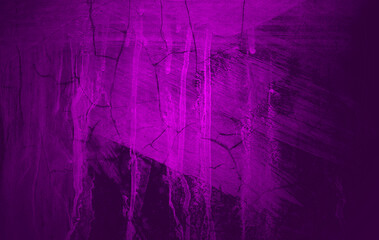 Purple concrete wall texture background. Cement wall with red and purple neon on dark background